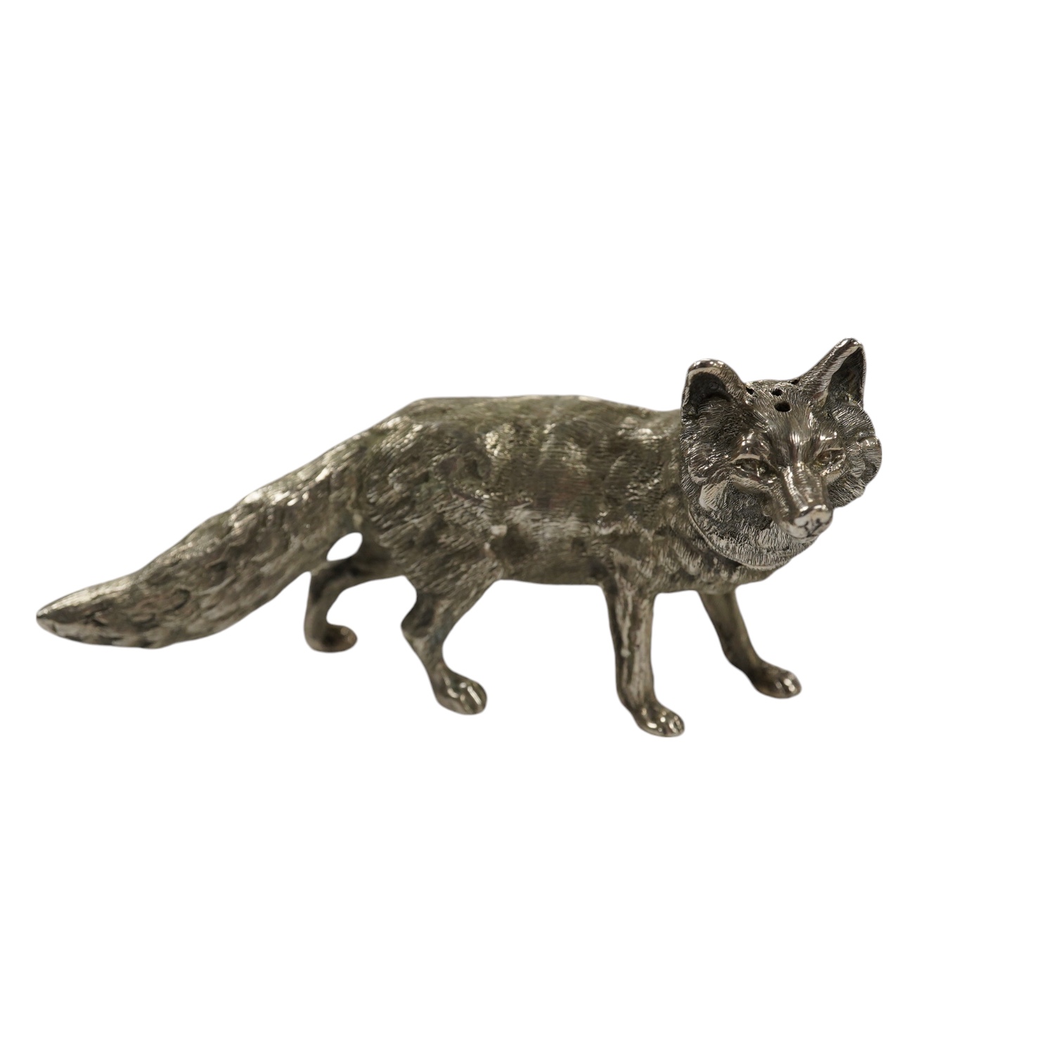 An Elizabeth II novelty silver condiment, modelled as a free standing fox, maker SMD Castings?, London, 1970, length 10.7cm, 4.3oz. Condition - fair to good